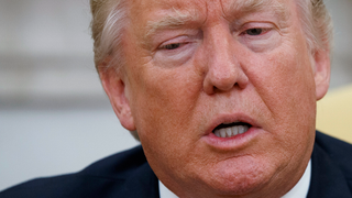Did a Russian Photographer Smuggle a Surveillance Device Into the White House?